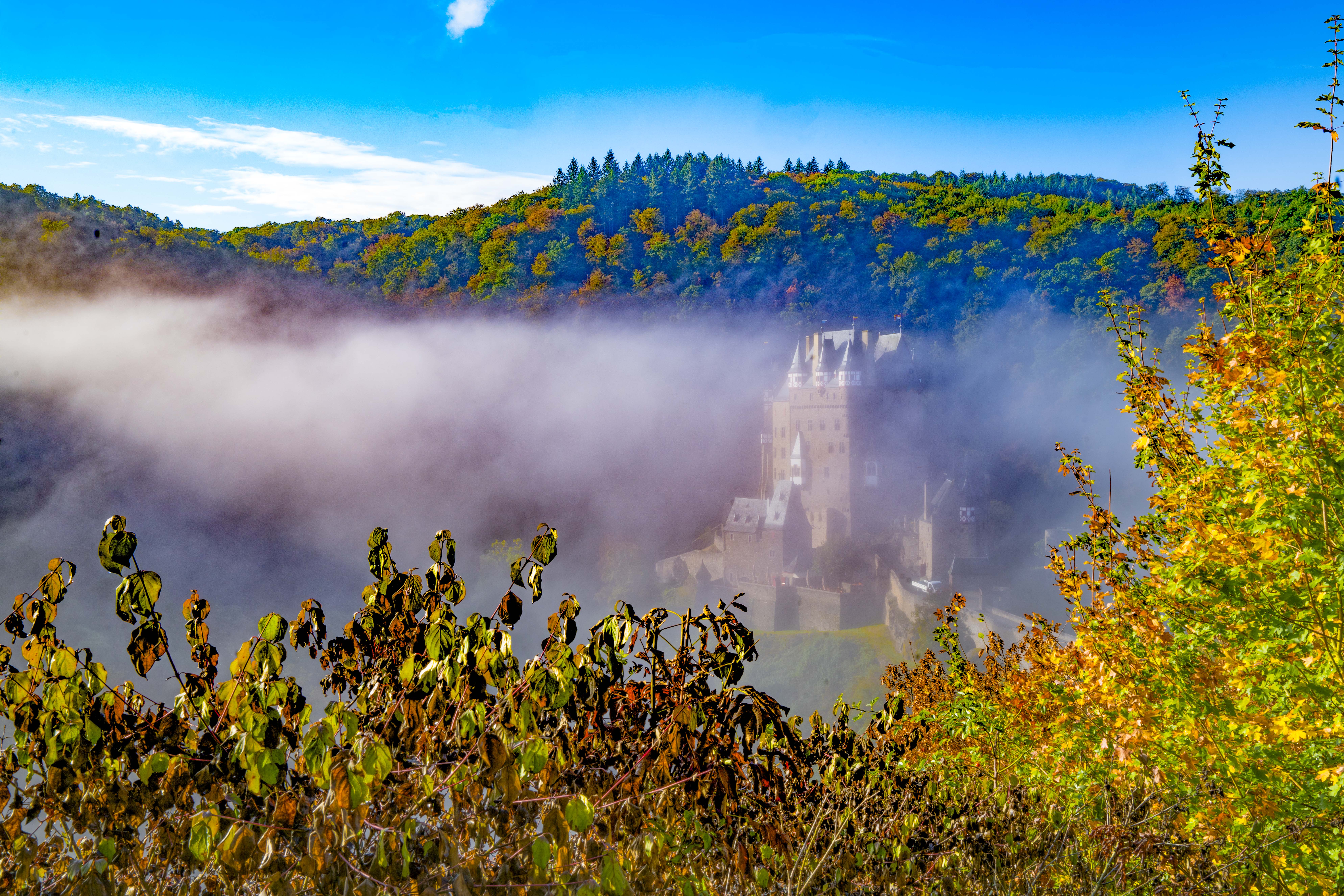 Eltz Castle and morning fog, Moselle River, Photographed by Tom Till