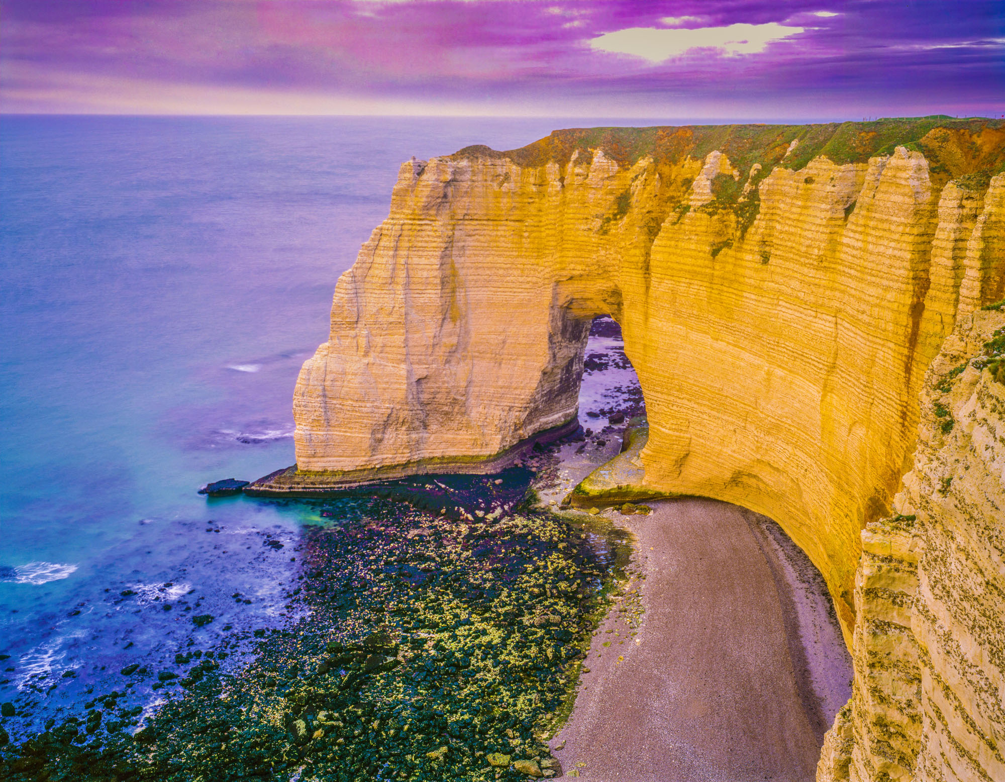 Sea arch, White Cliffs of Etretat, France photographed by Tom Till